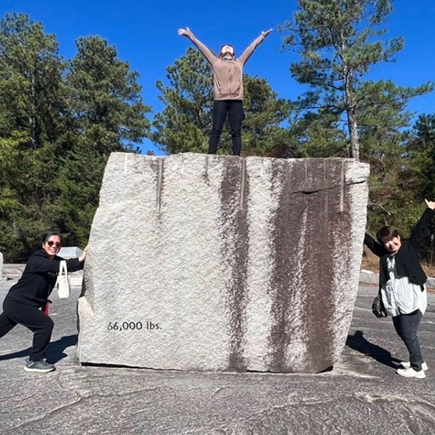 Person on top of rock