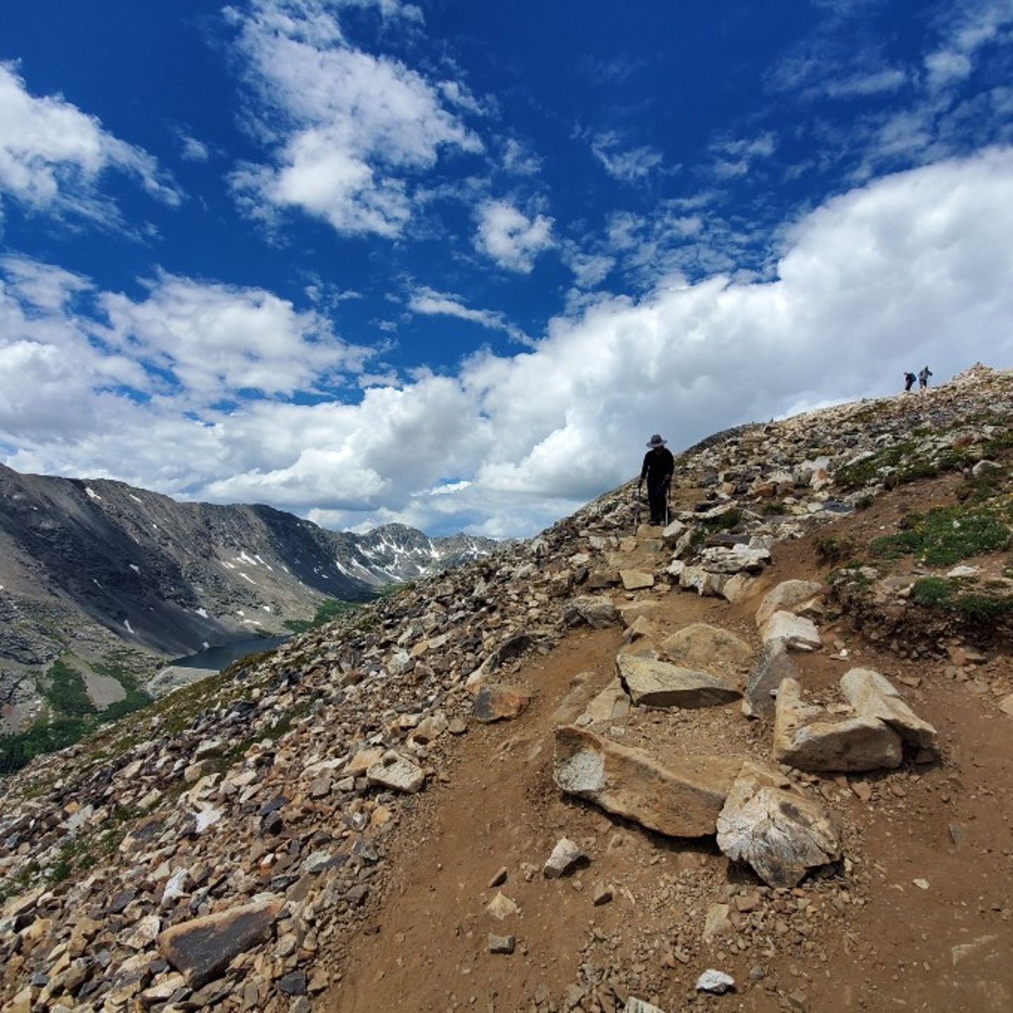 Person hiking on peak