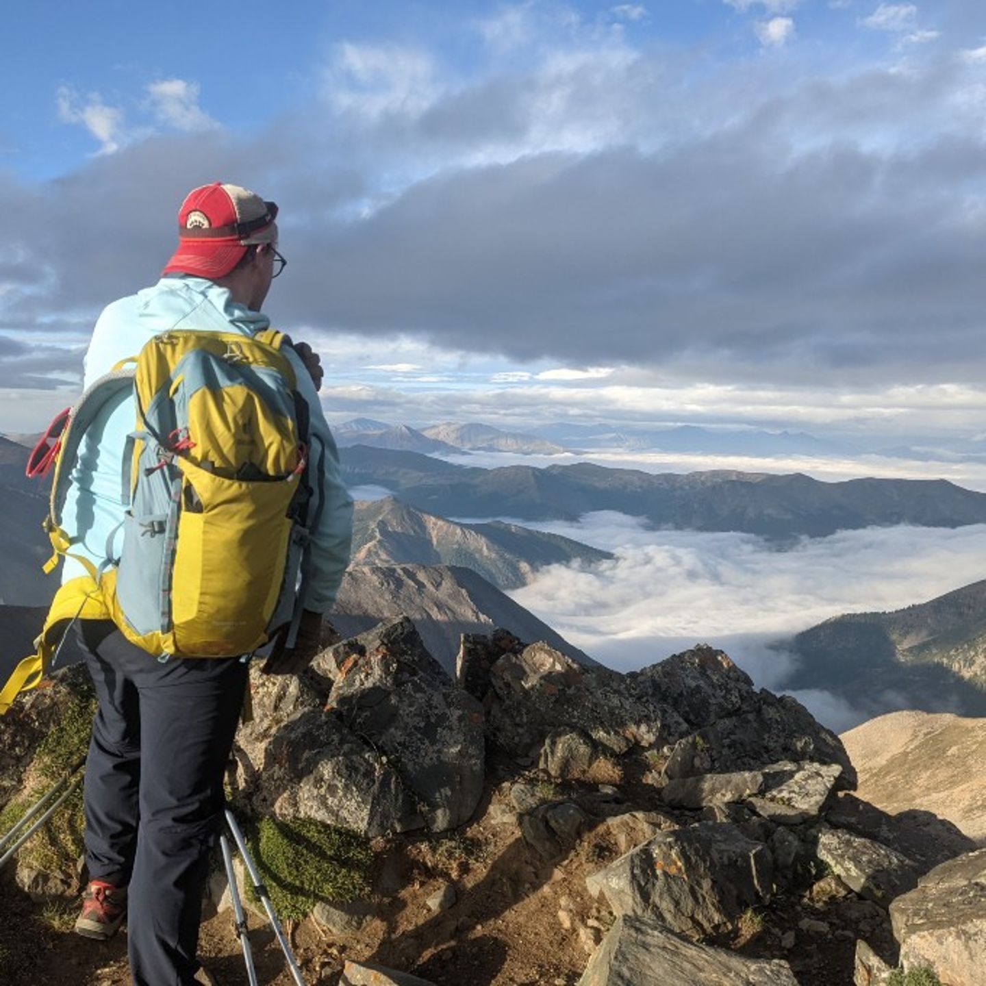 Person on top of peak