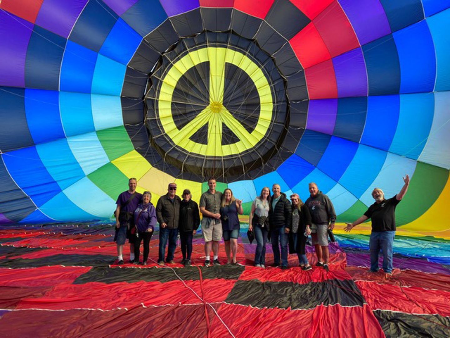 Group under balloon