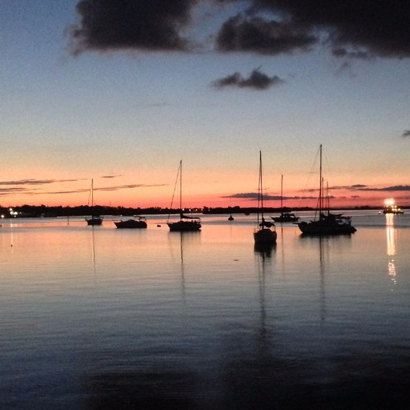 Boats on Water at Sunset