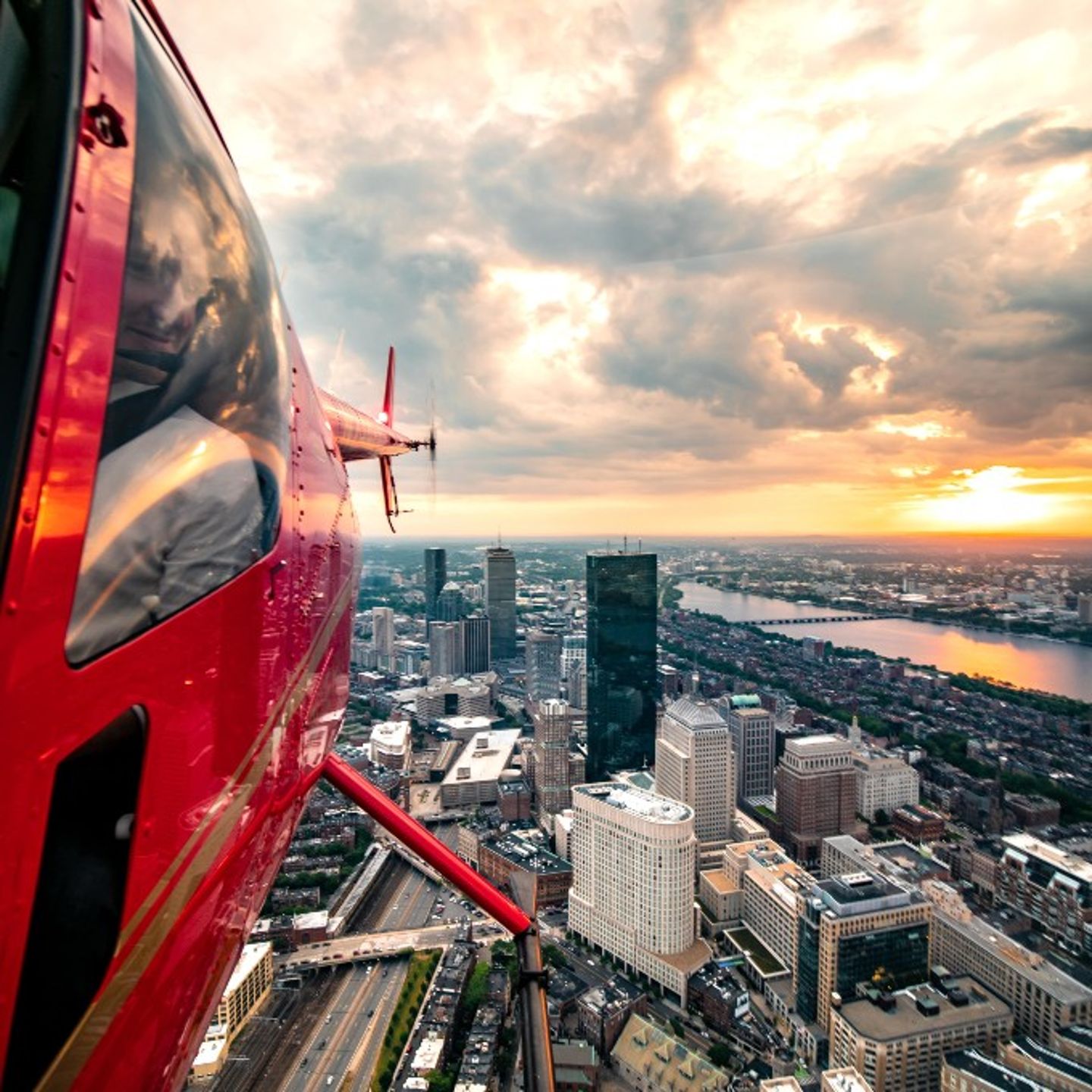 Helicopter flying at sunset