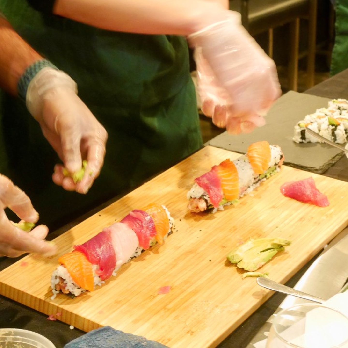 People making sushi