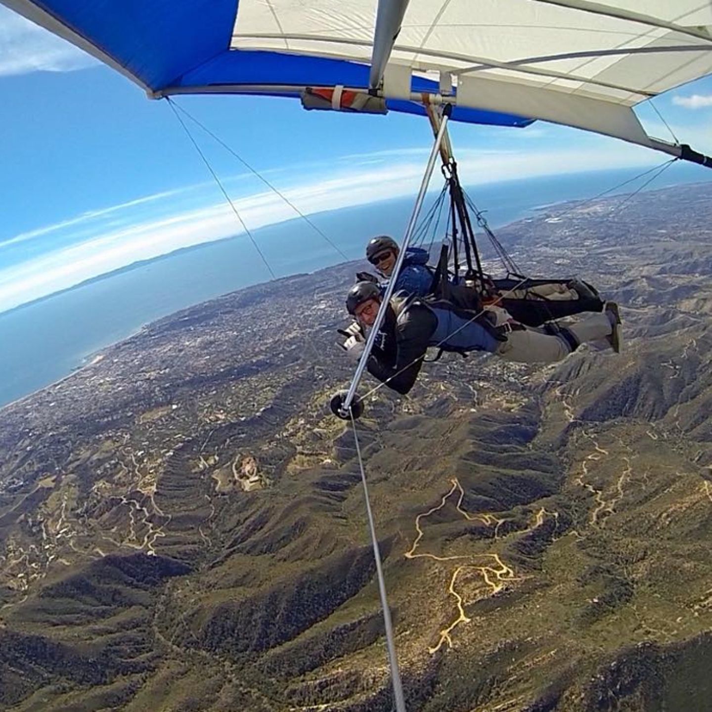 Two people flying