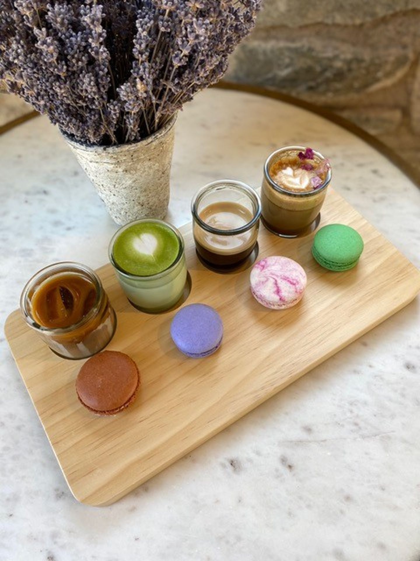 Flight of macarons and drinks
