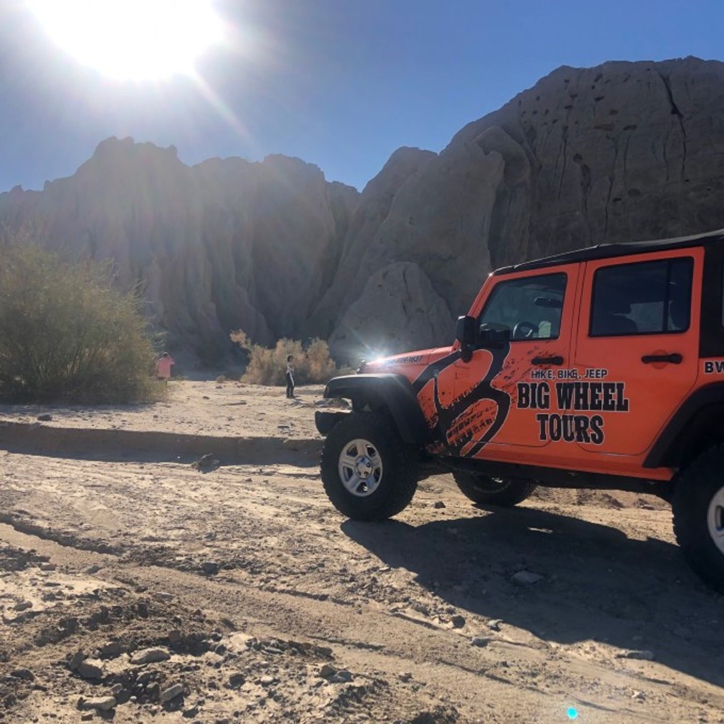 Jeep driving on dirt road