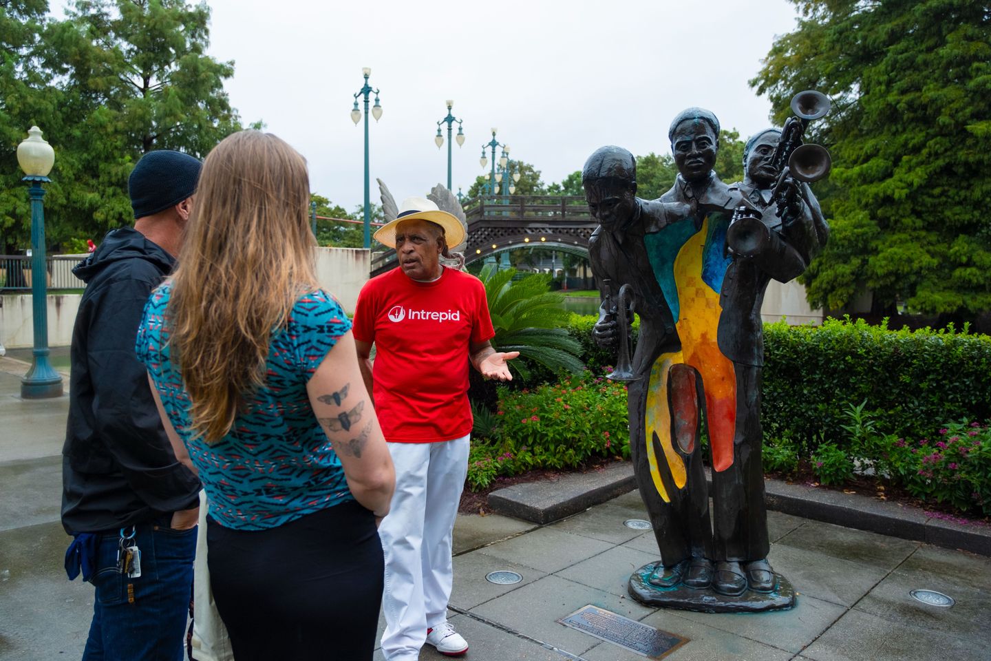 Guide with statue