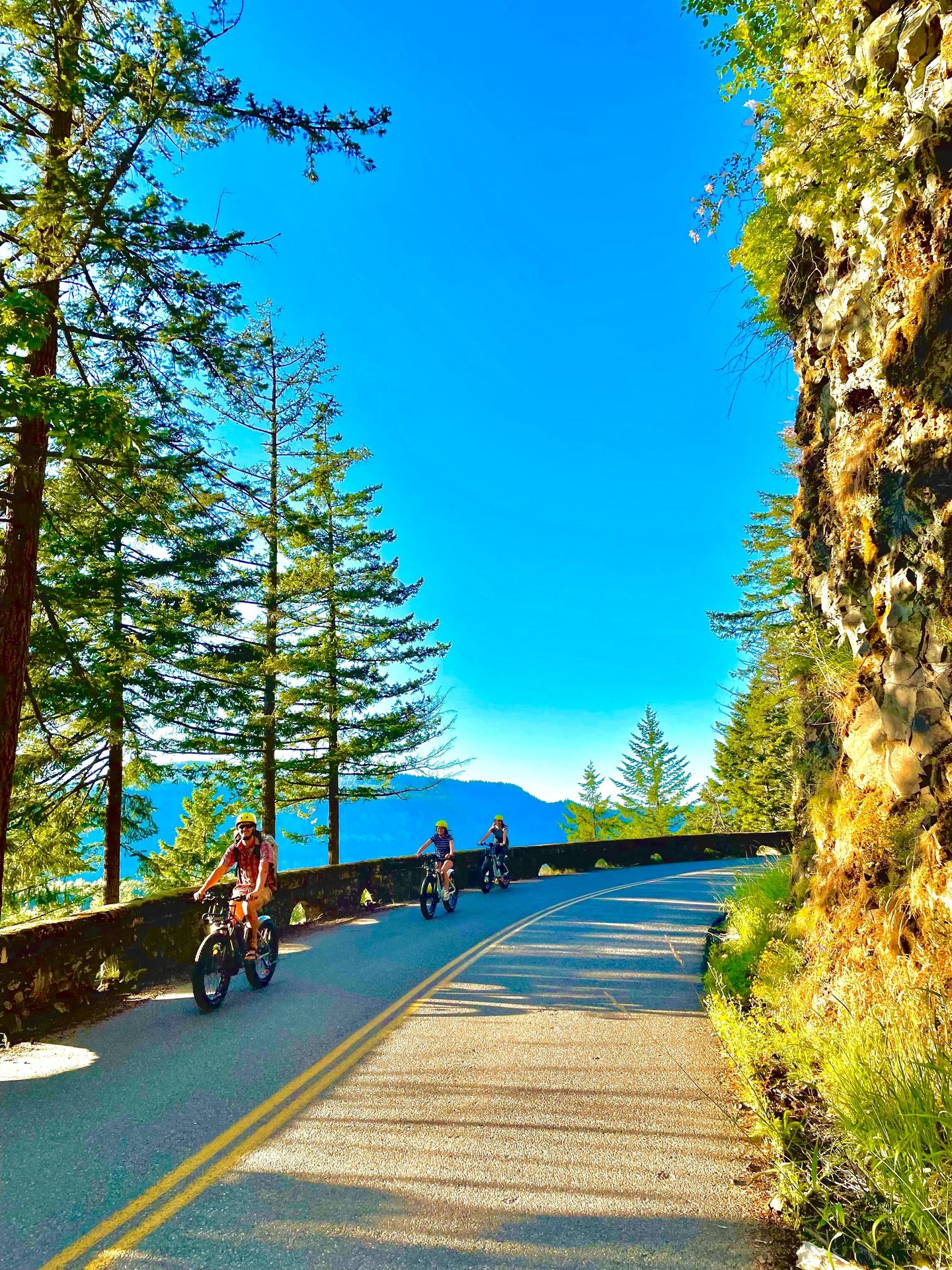 Group riding through mountains