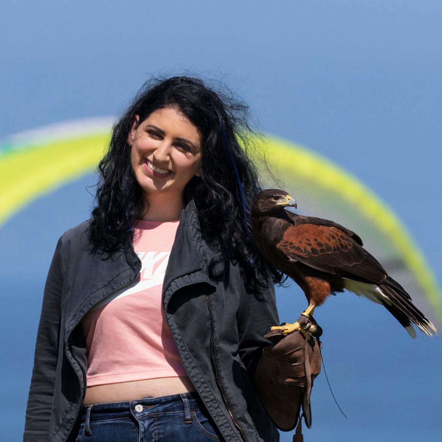 Woman holding falcon