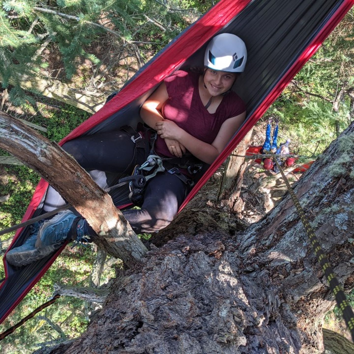 Woman laying in hammock