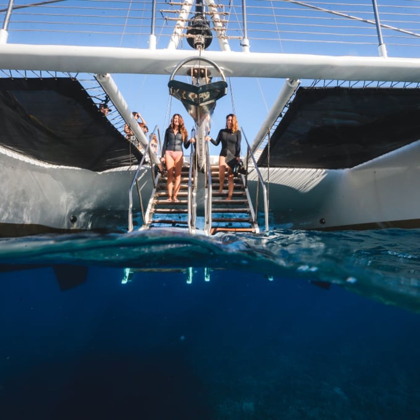 Couple walking into water