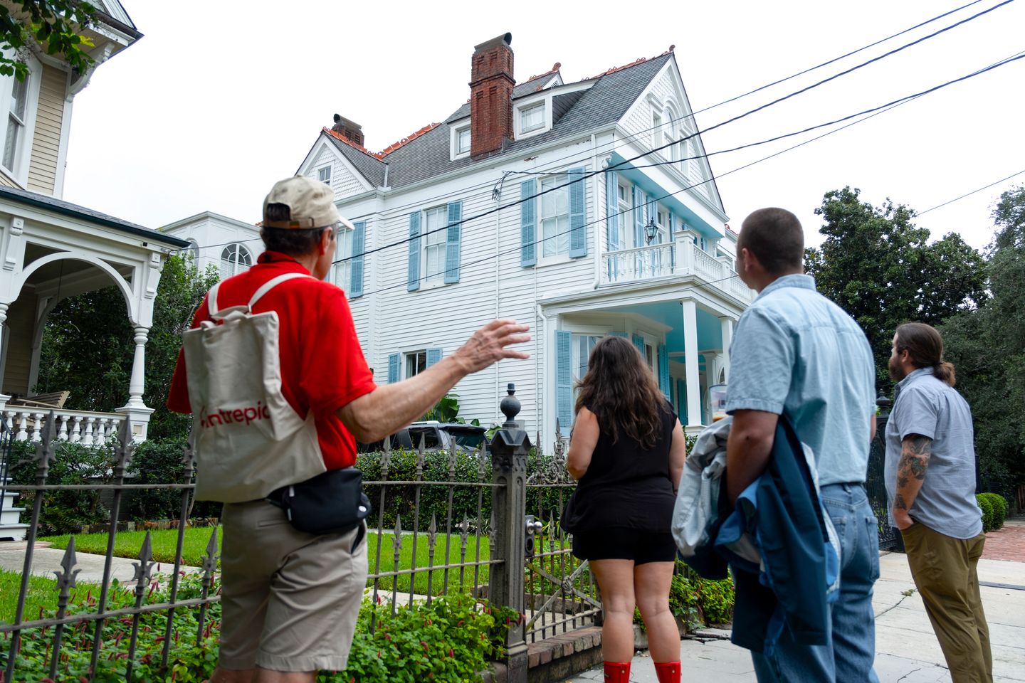 Guide talking about house