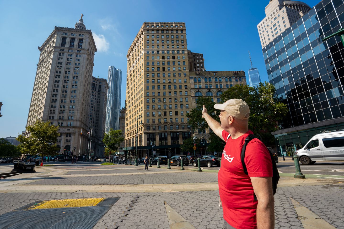 Guide pointing to building
