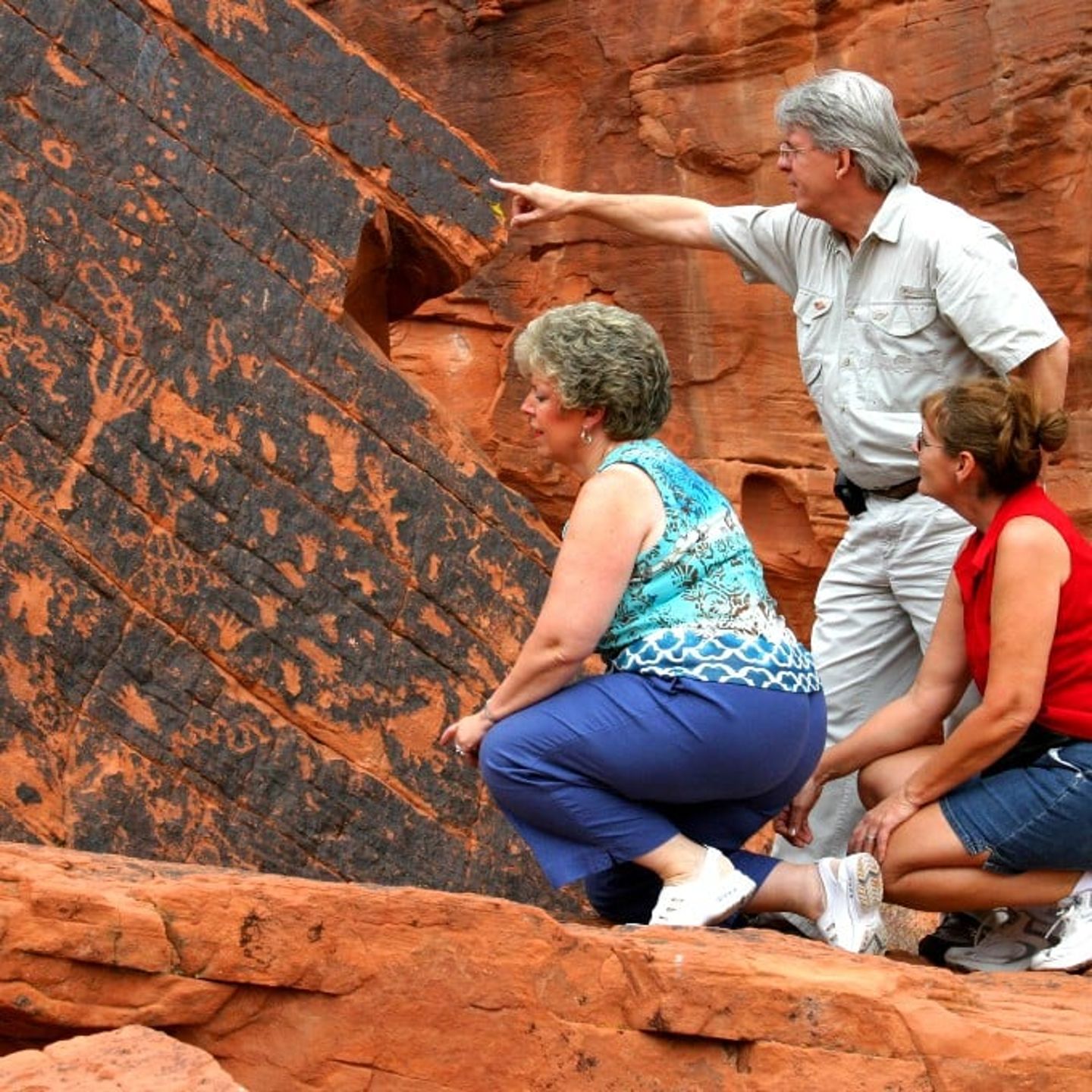 Group looking at wall markings