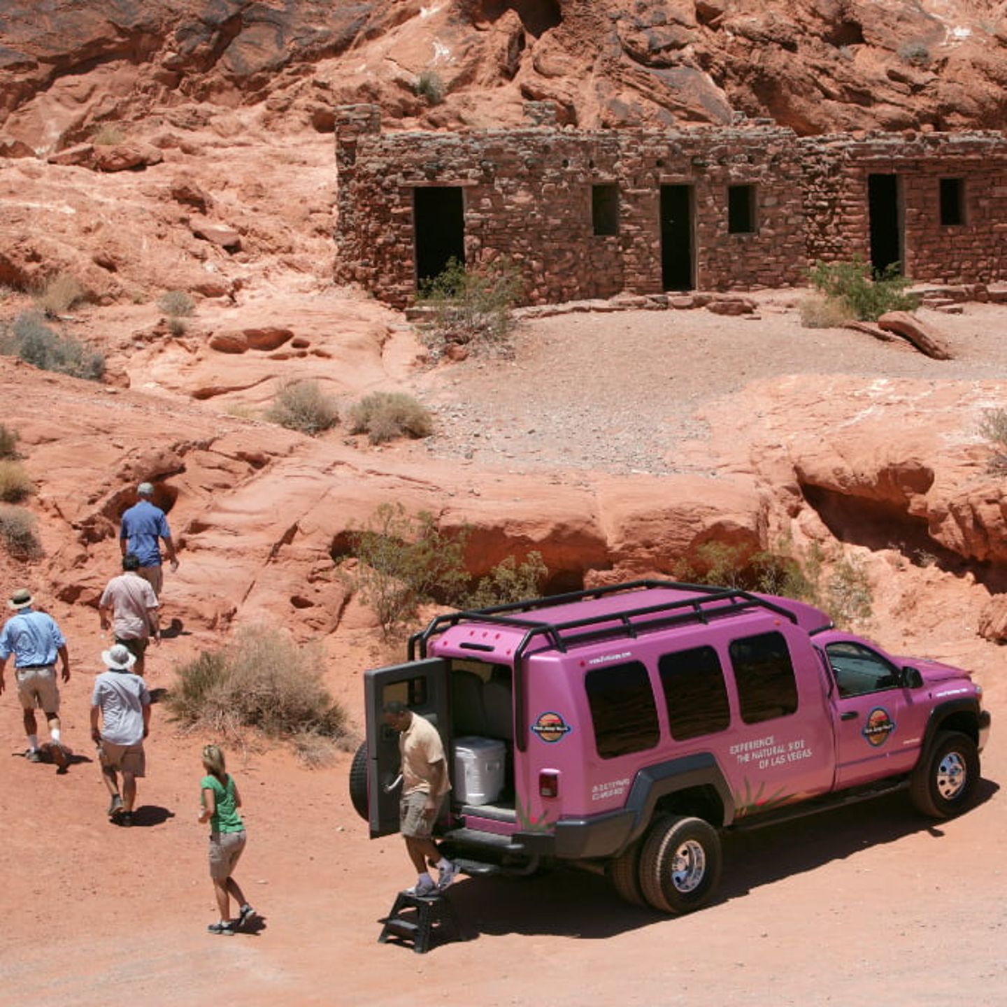 Group coming out of Jeep