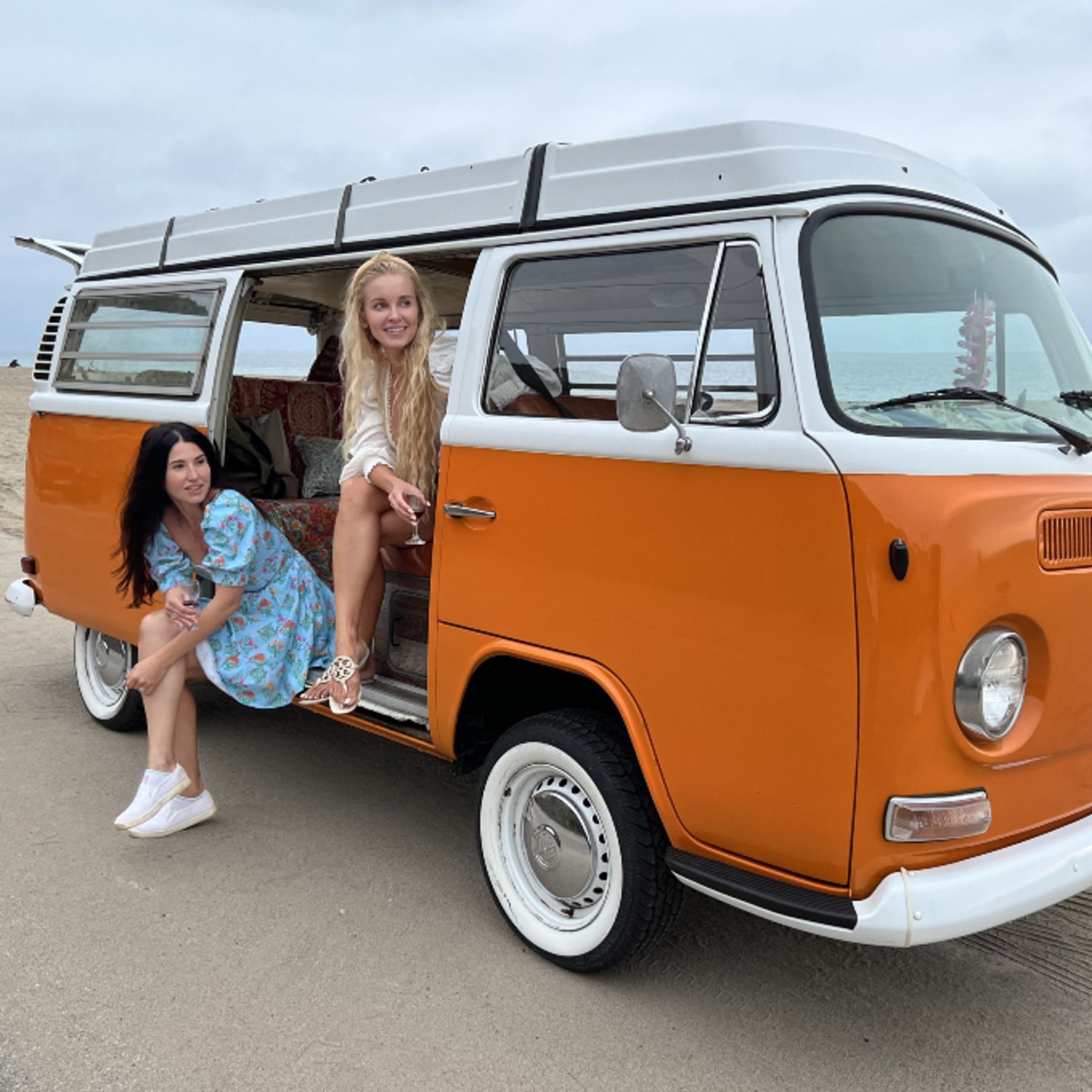 Two women in vintage van