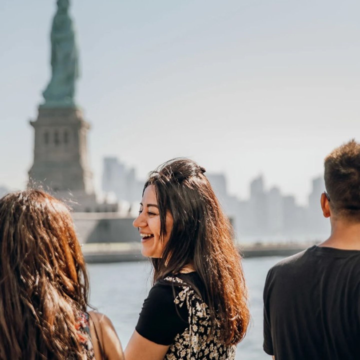 Group in Front of Statue of Liberty