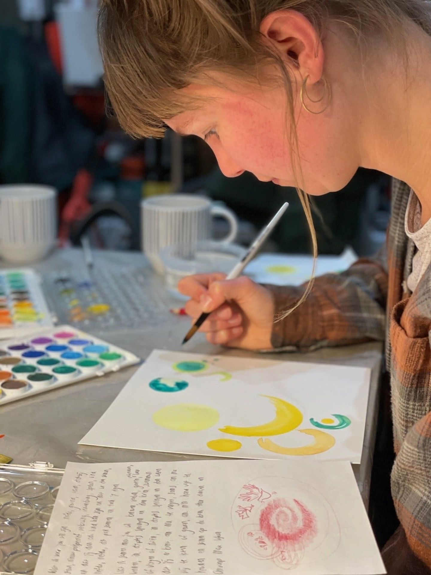 Woman wokring on art