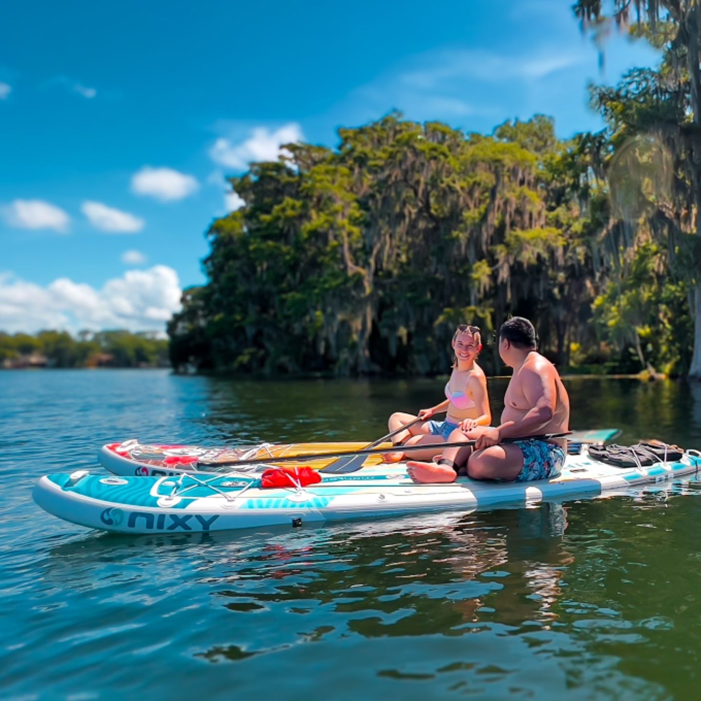 Two people paddleboarding