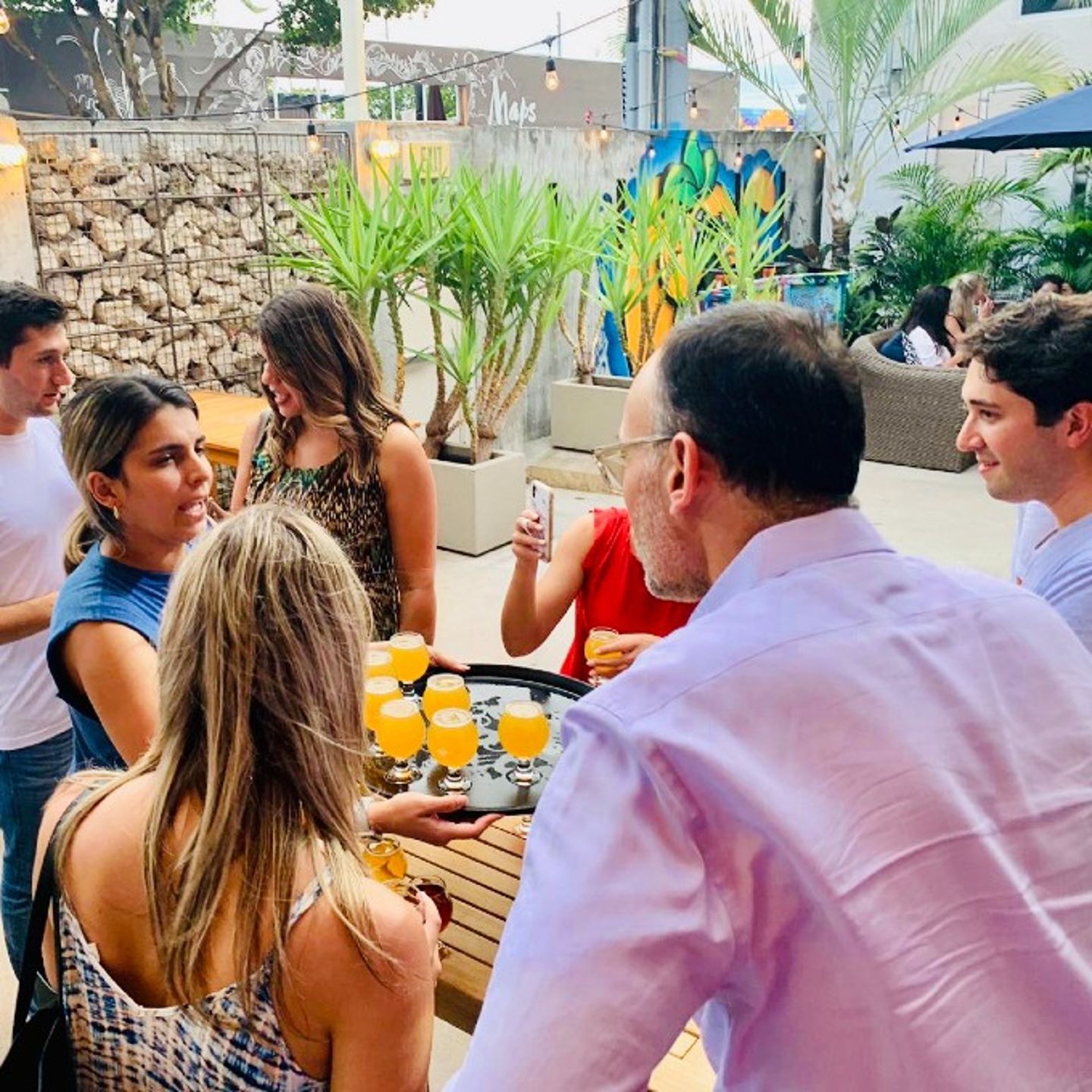 People being served drinks