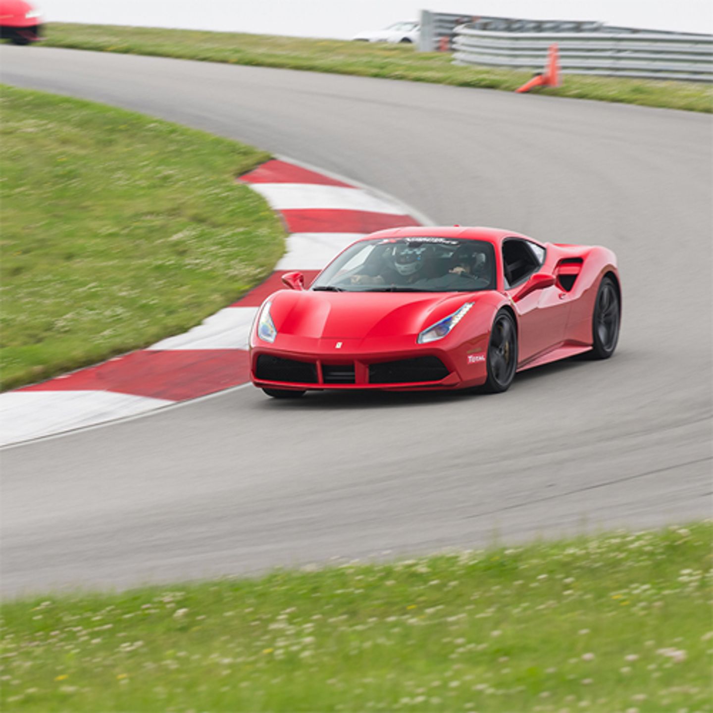 Race a Ferrari at Autobahn Country Club