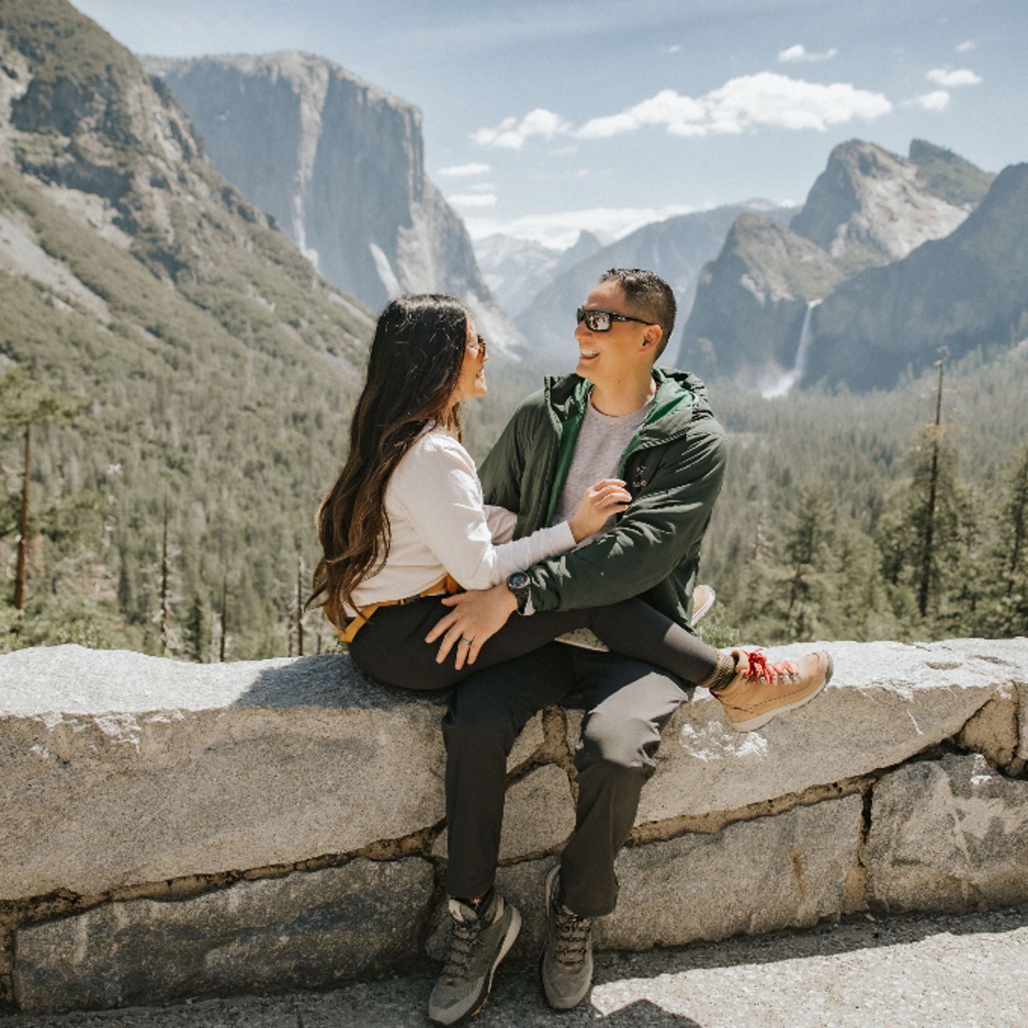 Couple sitting on ledge