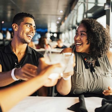 Hop-On Hop-Off Bus Tour and Dinner Cruise for Two