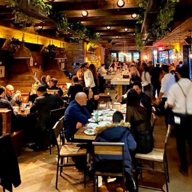 Loulou Petit Bistro & Speakeasy Shared Appetizer and Cocktails for Two with Live Entertainment